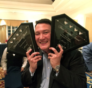 Anthony Carey holding Four Diamond award for The Siena Hotel and Il Palio